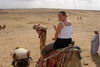 Camel ride by Egyptian PYRAMIDS